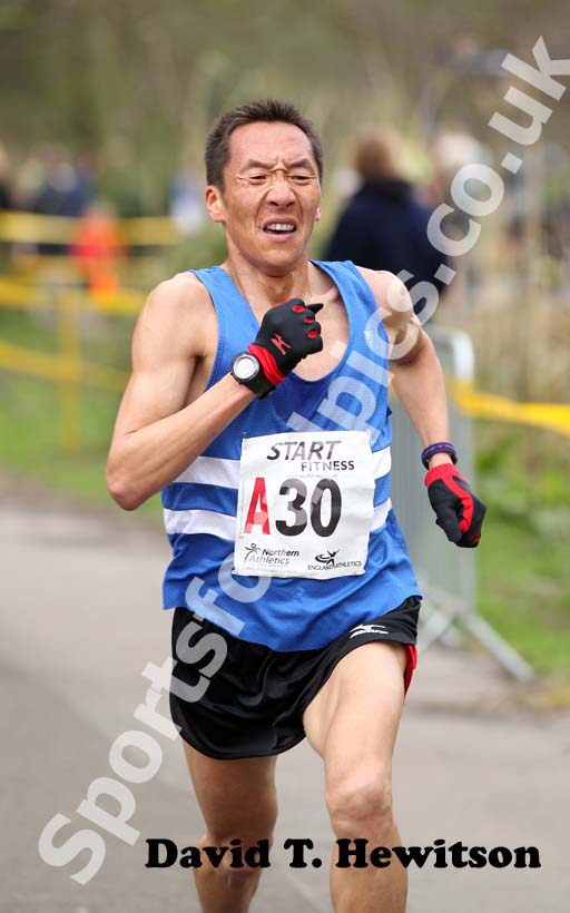 Serod Batochir (Morpeth Harriers) leads the Northern 12 Stage Relay.